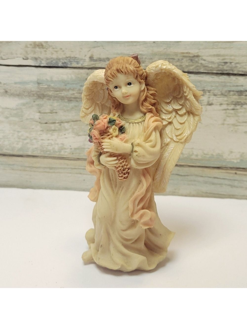 Angel Figurine with Flowers